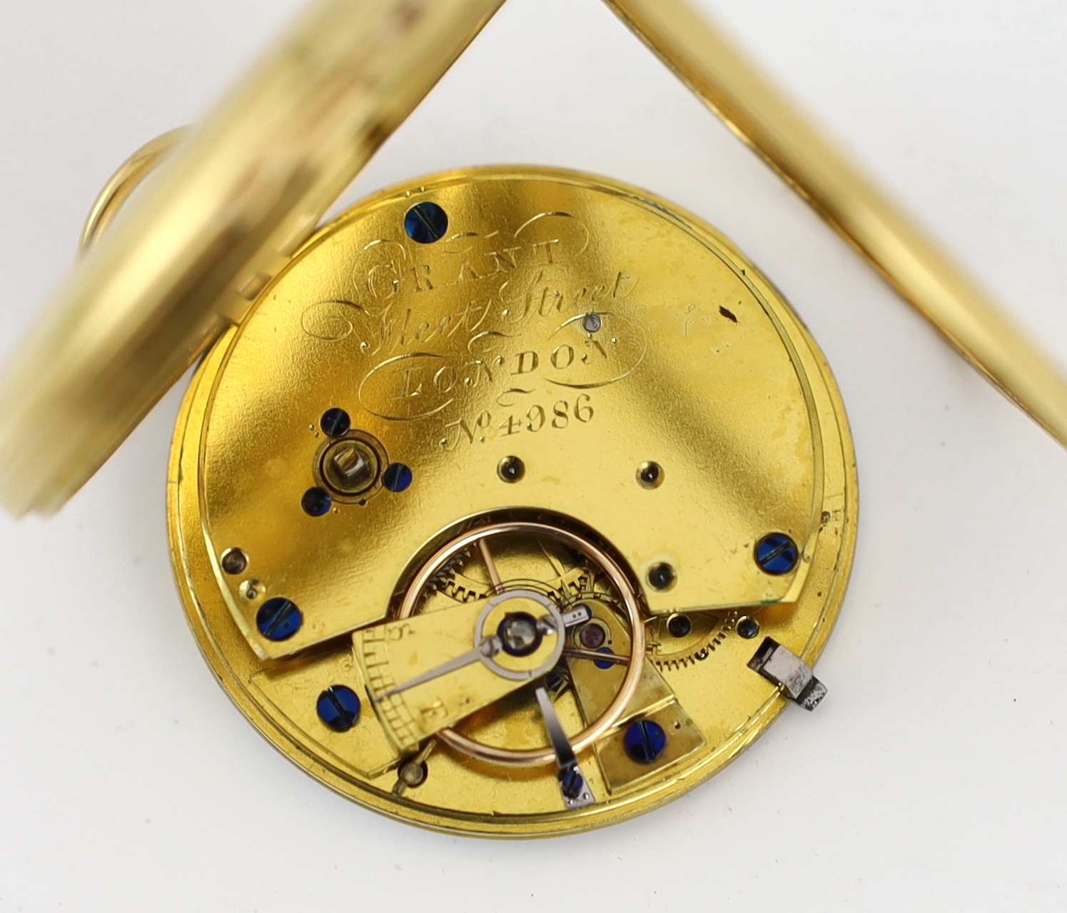 A Victorian engine turned 18ct gold open faced key wind pocket watch, by Grant of London